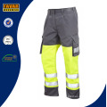 Poli / algodón multi pantalones de trabajo de bolsillos con cinta reflectante